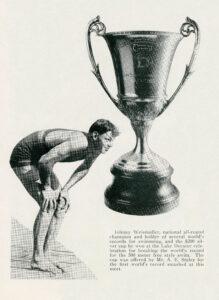 Johnny Weissmuller and his silver trophy